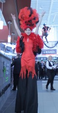 Stilt Walking Showgirl Fire Theme in Red Deer