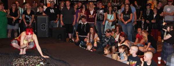 Sideshow Crowd watching Carisa Hendrix perform at Tattoo Fest